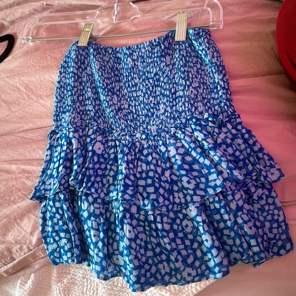 Blue square patterned mini skirt.